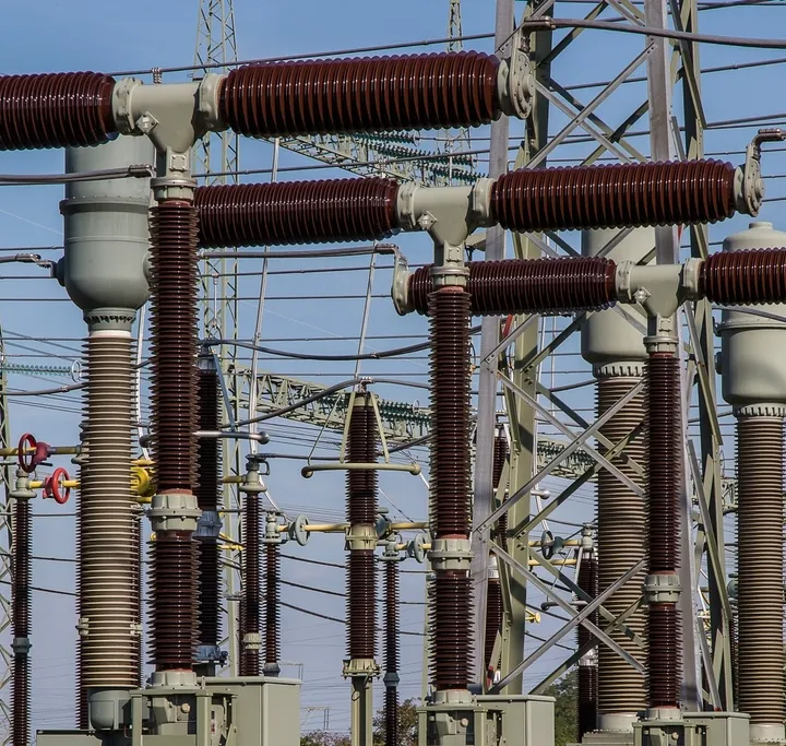 Insulators and switchgear at an electrical substation